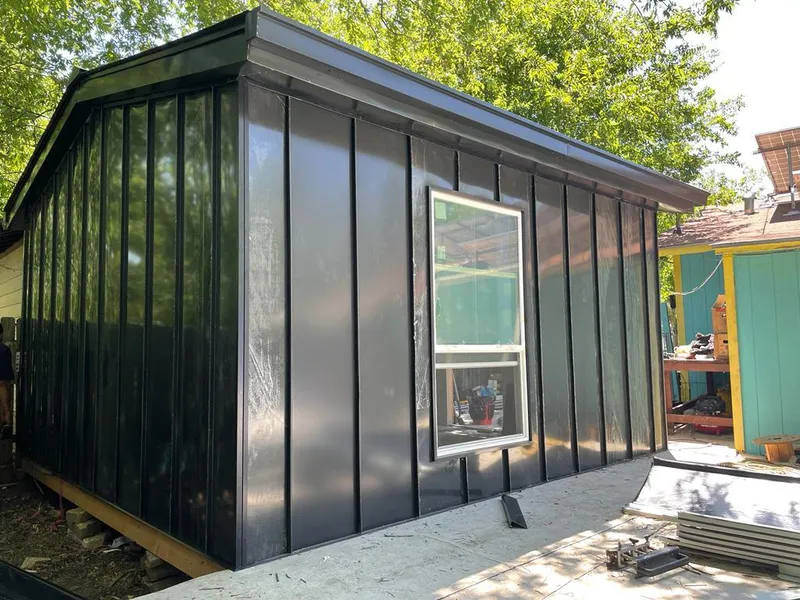 Black standing seam metal wall panels for Metal Roof Installation in Spencer